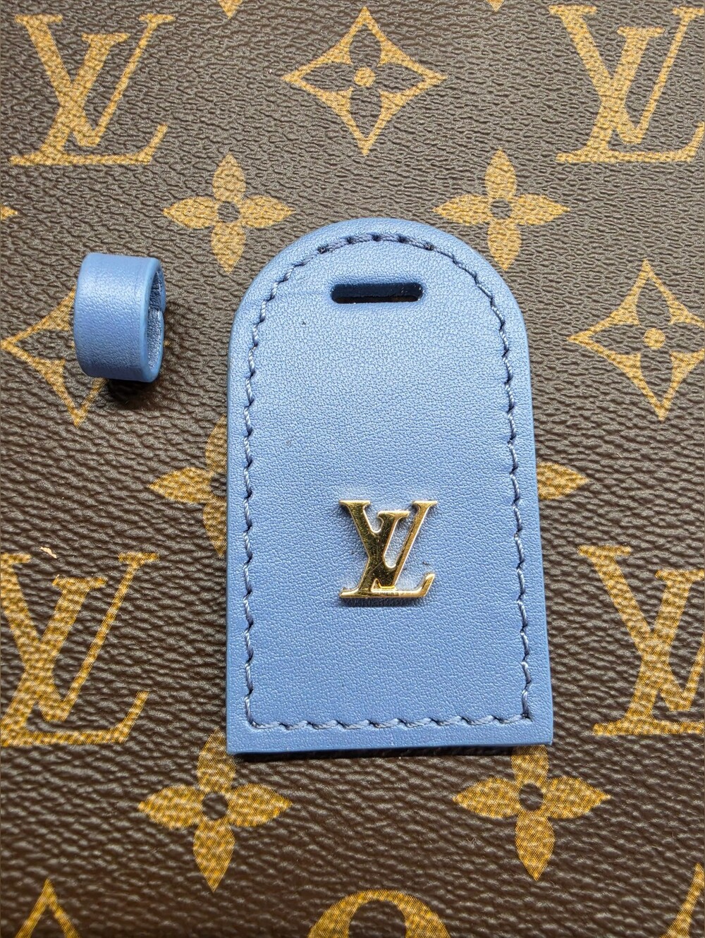 Louis Vuitton Light Blue Leather Name Tag with Gold LV Emblem